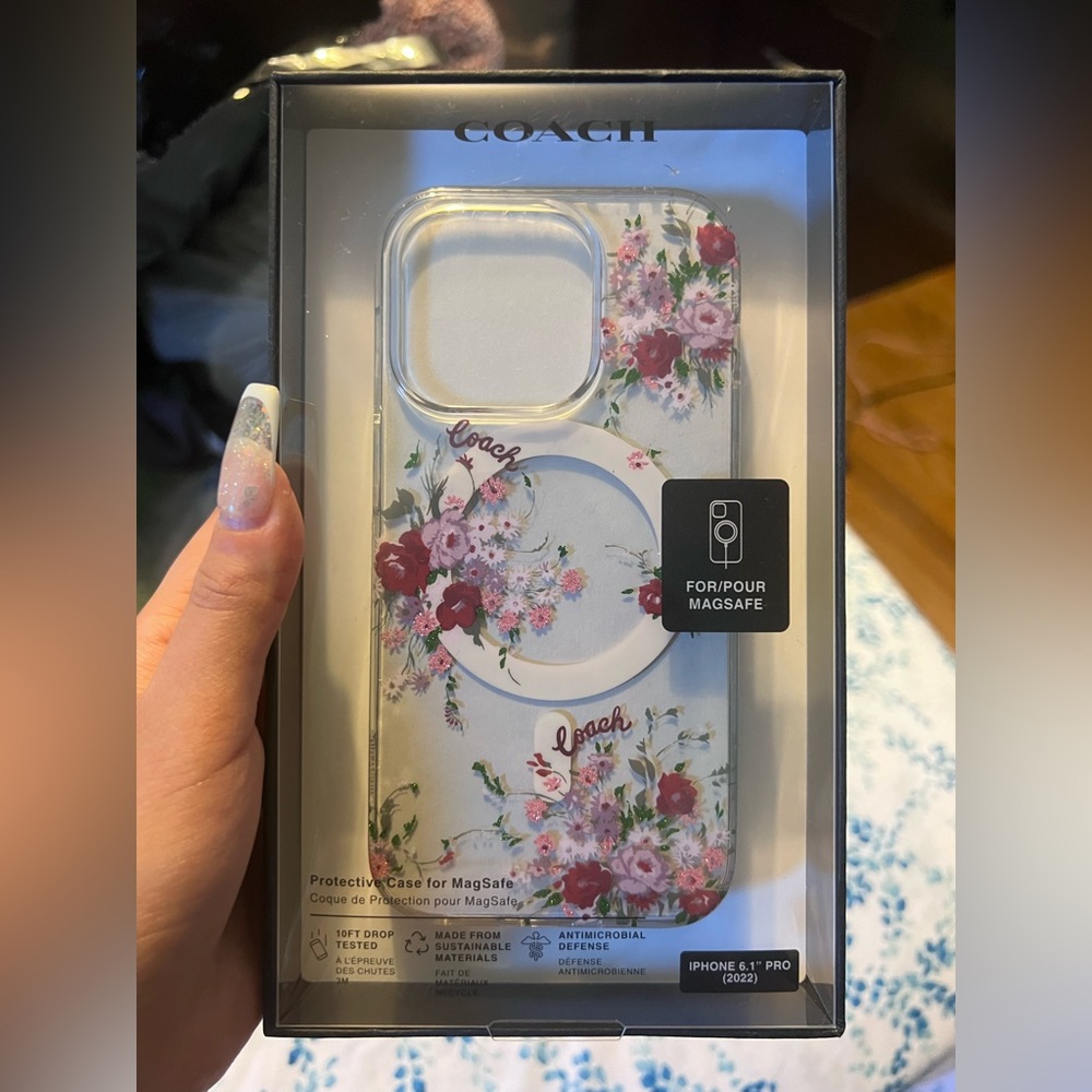 Selling this beautiful coach floral case for IPhone 14 Pro!